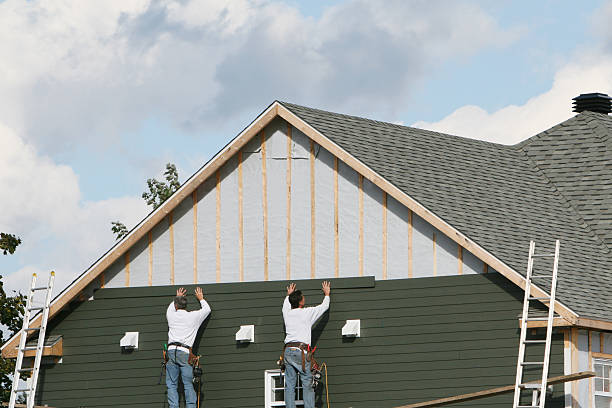Professional Siding technician working in Valley Stream, NY